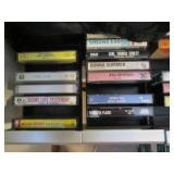 Assorted Cassette Tapes and Cassette Storage