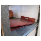 Content on Metal shelf including mi...