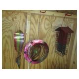 Colorful wind spinners and suet fee...