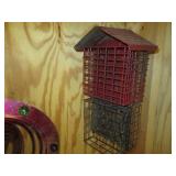 Colorful wind spinners and suet fee...