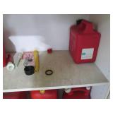 Lot of assorted size gas cans...