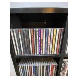Large Collection of Assorted Music CDs with Tall CD Shelf