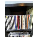 Large Collection of Assorted Music CDs with Tall CD Shelf