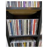 Large Collection of Assorted Music CDs with Tall CD Shelf