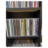 Large Collection of Assorted Music CDs with Tall CD Shelf