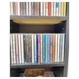 Large Collection of Assorted Music CDs with Tall CD Shelf