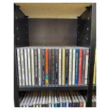 Large Collection of Assorted Music CDs with Tall CD Shelf