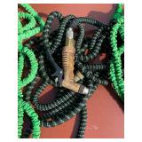 Assortment of Garden Hoses and Sprayers (5 Pieces)