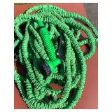 Assortment of Garden Hoses and Sprayers (5 Pieces)