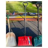 Lot of Snow Shovels, Car Snow Brushes, and Driveway Marking Stakes