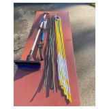 Lot of Snow Shovels, Car Snow Brushes, and Driveway Marking Stakes
