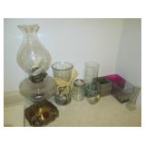 Vintage oil lamp, stones and home d...