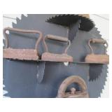 Saw blade and vintage iron display...
