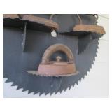 Saw blade and vintage iron display...