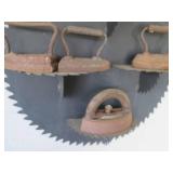 Saw blade and vintage iron display...