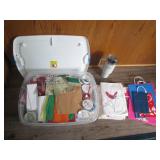 Shallow tote of gift giving supplie...
