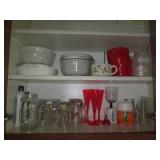 Cupboard filled with Corningwares, ...