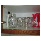 Cupboard filled with Corningwares, ...