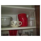 Cupboard filled with Corningwares, ...
