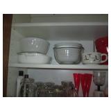 Cupboard filled with Corningwares, ...