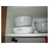Cupboard filled with Corningwares, ...