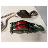 Two Double-Sleave (wheel) Pulleys and Two 1 1/4 Double-Wheeled Pulley.   Newer Pulley is 3/2" diameter. Vintage is 2" diameter.