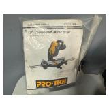 Pro-Tech 10" Compound Mitre Saw. Includes: Extension Arms, Stop Fence Plate and Clamp Assembly, Instruction Book