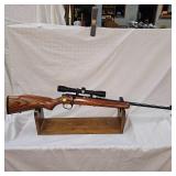Marlin 882 Bot Action 22 Mag, 4X Simmons Scope, Laminated Stock Marlin 882 Bot Action 22 Mag, 4X Simmons Scope, Laminated Stock