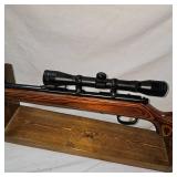 Marlin 882 Bot Action 22 Mag, 4X Simmons Scope, Laminated Stock Marlin 882 Bot Action 22 Mag, 4X Simmons Scope, Laminated Stock