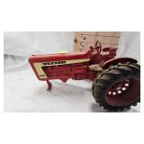1/16th Ertl IH Farmall 806, No Front Tires and 1/64 IH 2594 1/16th Ertl IH Farmall 806, No Front Tires and 1/64 IH 2594