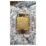 Vintage Golden Wheel Lighter with Peacock Design and Original Box