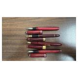 Set of 4 Vintage Red Fountain Pens with Gold and Silver Trim