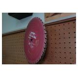 Assorted Saw Blades and Air Hose Assorted Saw Blades and Air Hose