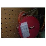 Assorted Saw Blades and Air Hose Assorted Saw Blades and Air Hose