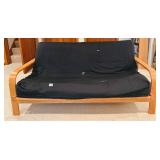 Wood Frame Futon Couch with Black Cover and Pillows Wood Frame Futon Couch with Black Cover and Pillows