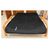 Wood Frame Futon Couch with Black Cover and Pillows Wood Frame Futon Couch with Black Cover and Pillows