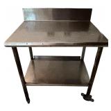 Vintage Stainless Steel Portable Table with Two Shelves Vintage Stainless Steel Portable Table with Two Shelves
