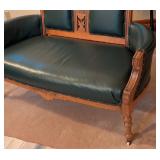 Beautiful Antique Eastlake Carved Walnut and Green Leather Settee Beautiful Antique Eastlake Carved Walnut and Green Leather Settee