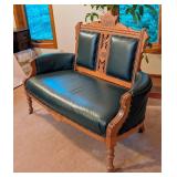 Beautiful Antique Eastlake Carved Walnut and Green Leather Settee Beautiful Antique Eastlake Carved Walnut and Green Leather Settee