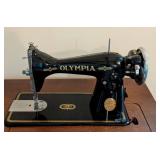 Olympia Treadle Sewing Machine and Cabinet Olympia Treadle Sewing Machine and Cabinet
