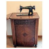 Olympia Treadle Sewing Machine and Cabinet Olympia Treadle Sewing Machine and Cabinet