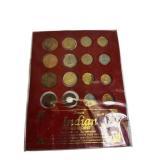 A mix of different coins and stamps, including a special silver German coin from 1874. A mix of different coins and stamps, including a special silver German coin from 1874.