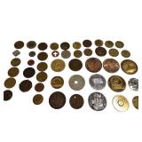 A bag of assorted tokens from various locations. It A bag of assorted tokens from various locations. It