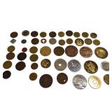 A bag of assorted tokens from various locations. It A bag of assorted tokens from various locations. It
