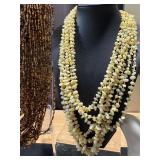 Assorted Fashion Jewelry Collection with Amber Pendant and Beaded Necklaces Assorted Fashion Jewelry Collection with Amber Pendant and Beaded Necklaces