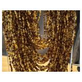 Assorted Fashion Jewelry Collection with Amber Pendant and Beaded Necklaces Assorted Fashion Jewelry Collection with Amber Pendant and Beaded Necklaces