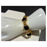 Matching Gold-Tone Bracelet and Earrings Set with Black Accents Matching Gold-Tone Bracelet and Earrings Set with Black Accents