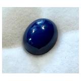 6.83 Carat Synthetic Blue Star Sapphire Oval Cabochon 6.83 Carat Synthetic Blue Star Sapphire Oval Cabochon