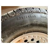 4 - 15" Alum Rims, 1 with Wild Country Radial XRT 235/75R15 4 - 15" Alum Rims, 1 with Wild Country Radial XRT 235/75R15