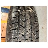 4 - 15" Alum Rims, 1 with Wild Country Radial XRT 235/75R15 4 - 15" Alum Rims, 1 with Wild Country Radial XRT 235/75R15